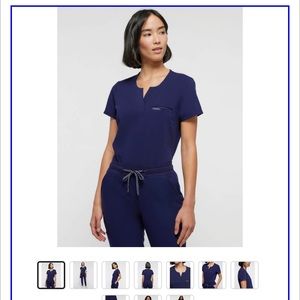 Jaanuu navy blue scrub set. New with tags. Small jogger pants and medium shirt.
